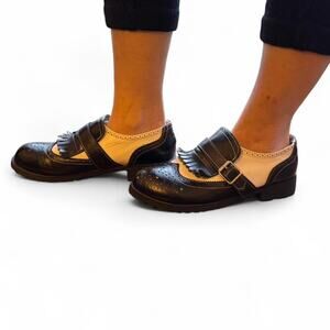 Black and cream leather mary Jane's